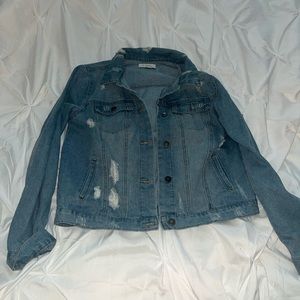Distressed denim jacket